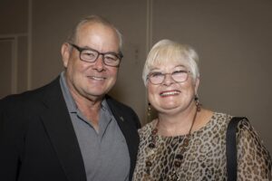 A man and woman posing for the camera.