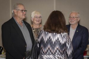 A group of people standing next to each other.