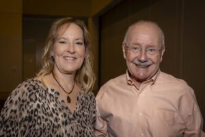 A woman and man standing next to each other.