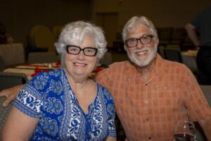 A man and woman posing for the camera.
