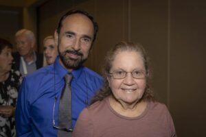 A man and woman posing for the camera.