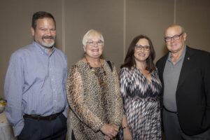 A group of people standing next to each other.