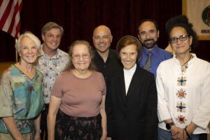 A group of people standing next to each other.