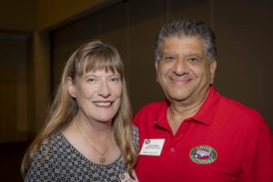 A man and woman posing for the camera.