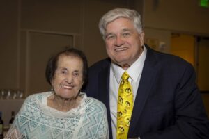 A man and woman posing for the camera.