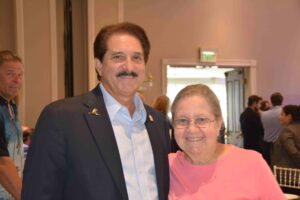 A man and woman posing for the camera.