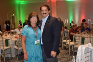 A man and woman posing for a picture.