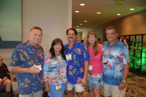 A group of people standing next to each other.