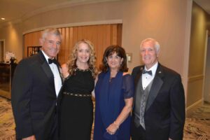 A group of people standing next to each other.