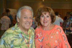A man and woman posing for the camera.