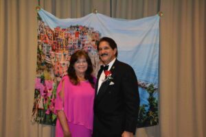 A man and woman posing for a picture.