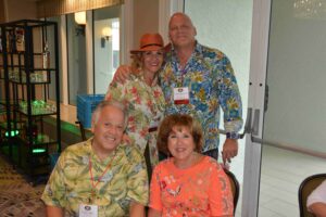 A group of people standing next to each other.